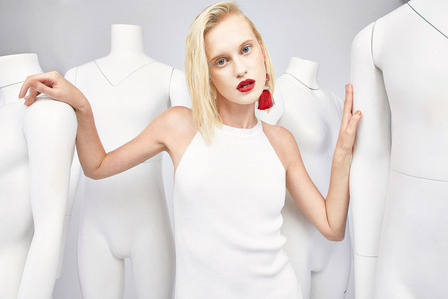 photo model in white dress with ghost mannequins