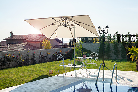 garden umbrella on villa with pool