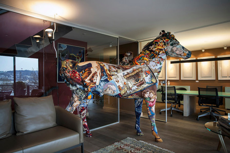 office interior with artwork, horse made of patchwork