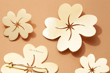 gold clover brooch