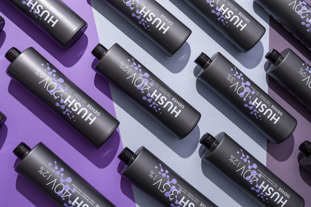 hair cream packages on blue purple background