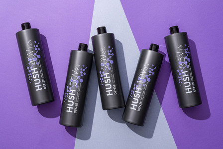 hair cream packages on blue purple background