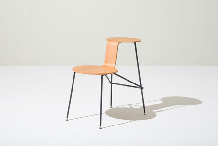 design chair made of wood and steel on plain background
