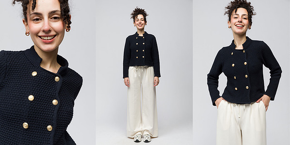model with womens suit on plain background