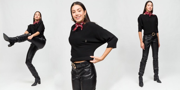 photo model with black leather pants and black pull over