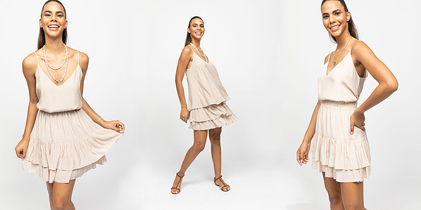 photo model in dress on plain background