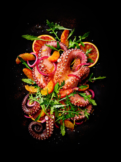 A deconstructed octopus and blood orange salad,  perfect for editorial, advertising and restaurant food photography, shot by food photographer, Sid Ali