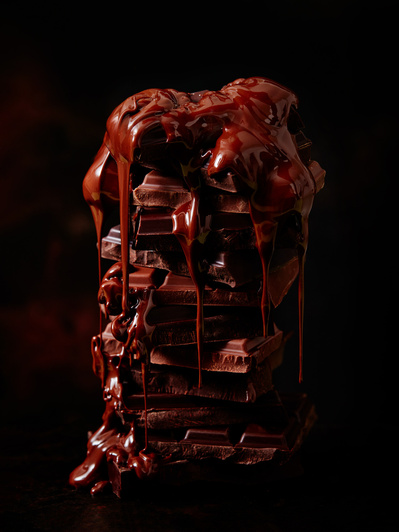 A dripping stack of chocolate, perfect for editorial, advertising and restaurant food photography, shot by food photographer, Sid Ali