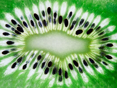 A close up macro of a kiwi fruit, perfect for editorial, advertising and restaurant food photography, shot by food photographer, Sid Ali