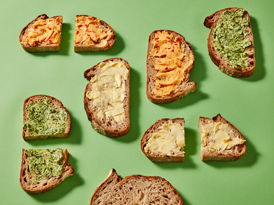 A graphic bread arrangements with different toppings , perfect for editorial, advertising and restaurant food photography, shot by food photographer, Sid Ali