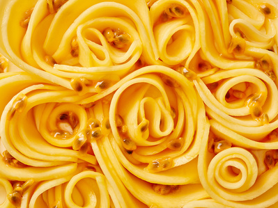 A close up macro shot of mango swirls, perfect for editorial, advertising and restaurant food photography, shot by food photographer, Sid Ali