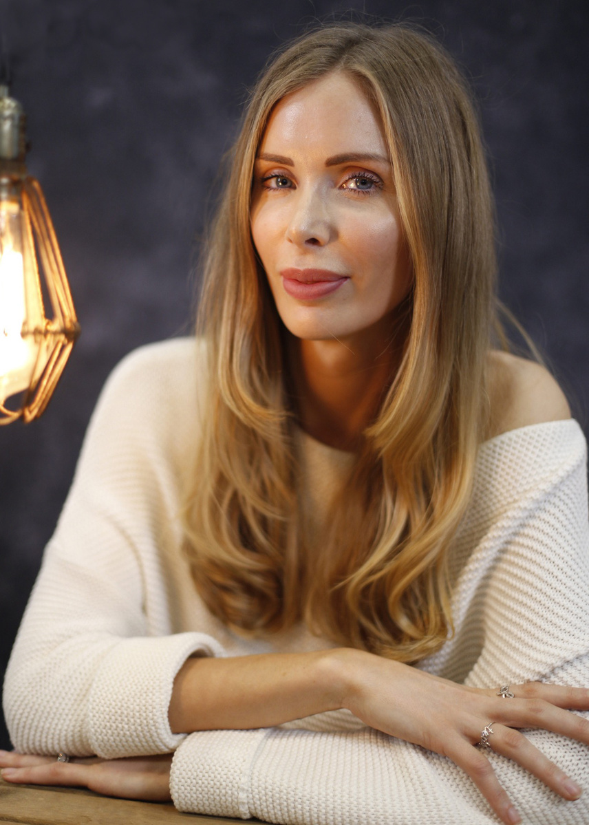 Personal Branding image of a woman with blonde hair against a studio background