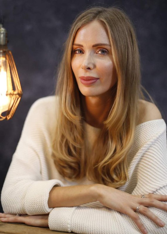 Personal Branding image of a woman with blonde hair against a studio background