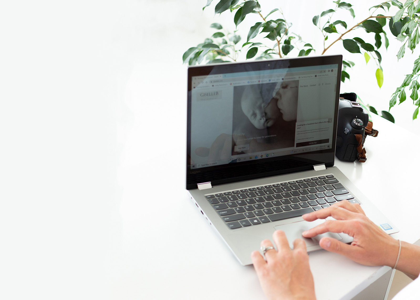 giselle b photography; working on a laptop; personal branding image; personal branding photography; photographer at work