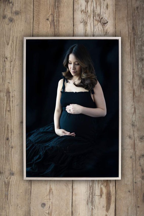 Beautiful Maternity wall art of a pregnant woman printed on Aluminium with an oak frame.  