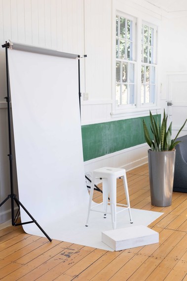 White studio photography backdrop.  Natural light studio.  White window.  Old school building