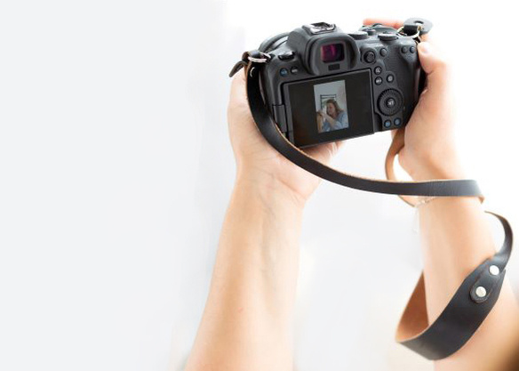 Taking a photo; photographer in action; behind the scenes; canon photography
