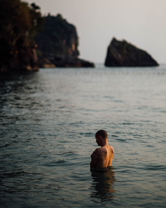 Man at Railay beach in water