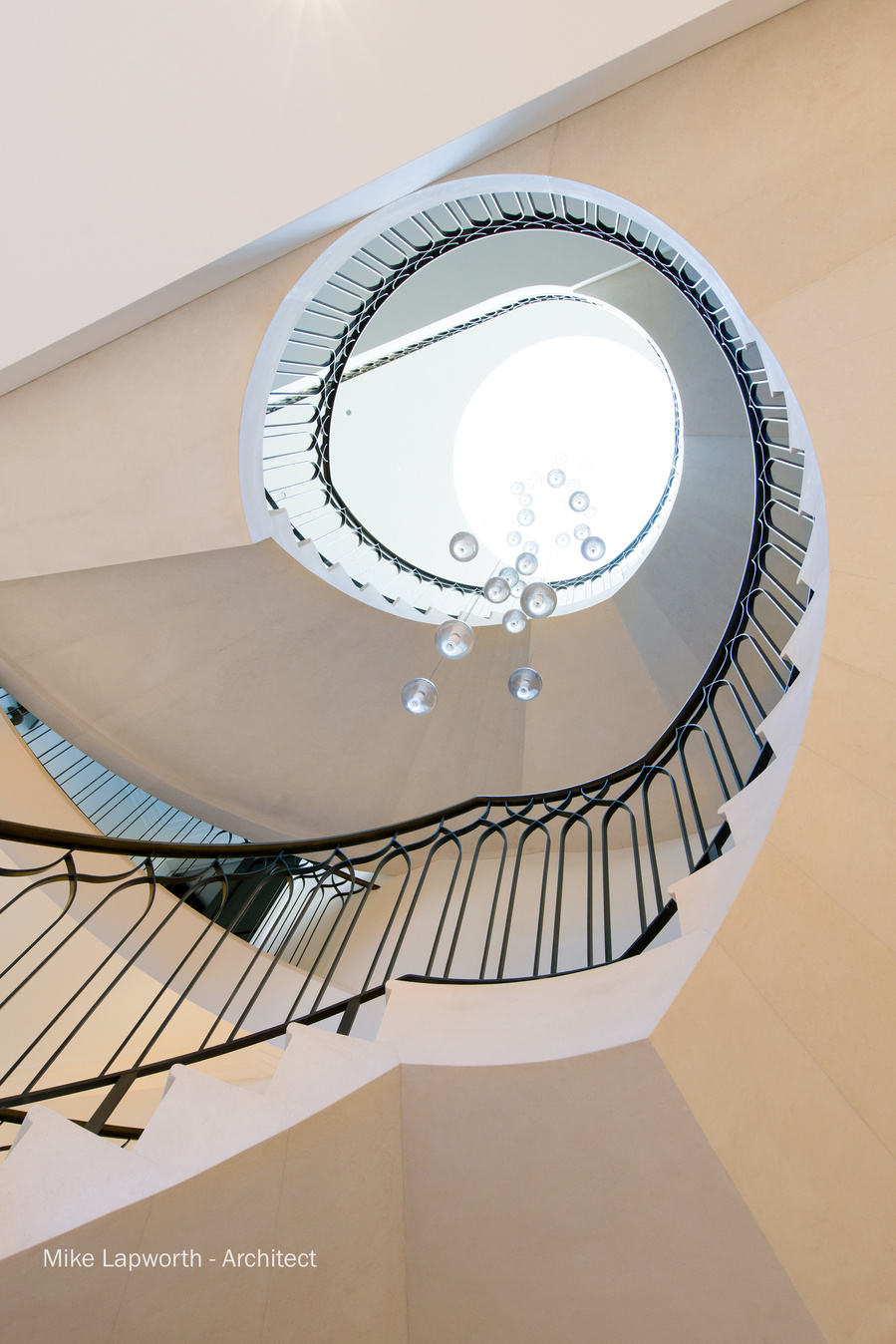 Arcitectural design by Mike Lapworth. 
New build spiral staircase interior. Photohgraphy by Sandry Studio