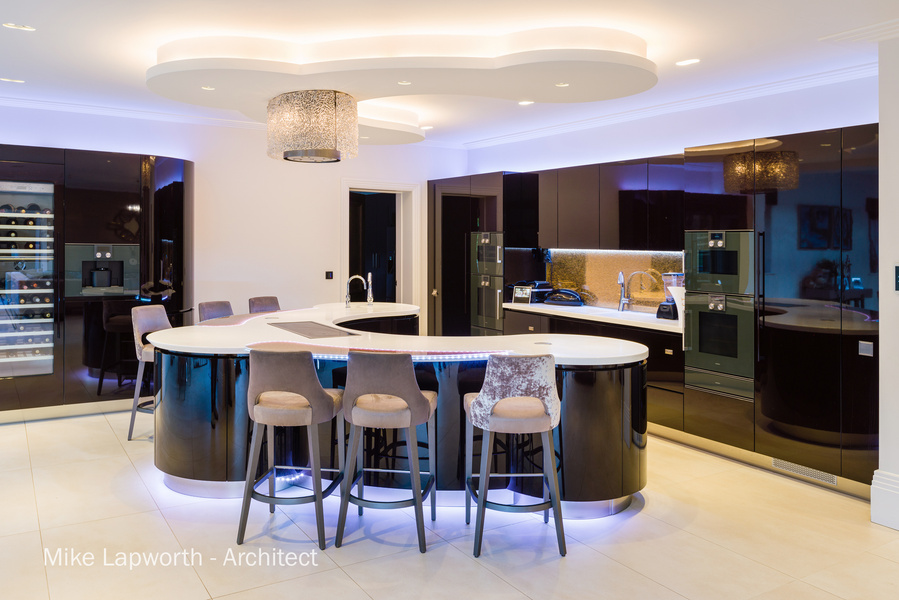 Arcitectural design by Mike Lapworth. 
New build room interior Photohgraphy by Sandry Studio Kitchen with purple lighting