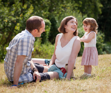 Black and White Family portrait taken outside by Sandry Studio - professional photographers. Relaxed and informal.