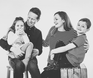 Black and White Family portrait taken in studio by Sandry Studio - professional photographers