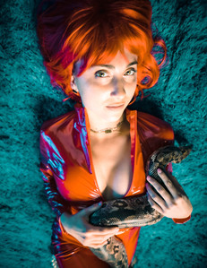 trippy psychedelic hypnosis kaa the snake photography red cat suit black spandex bondage fetish red wig blue shag carpet surreal art photo zandervision zander fieschko
