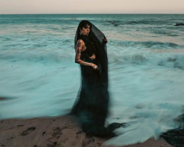 ocean goddess offering fish in ritual, spooky photography, psychedelic photography, storytelling, myth, trippy headshot, high fashion, surreal photography, dream photography, los angeles portrait photographer, fantasy, dark fantasy, stylized headshots