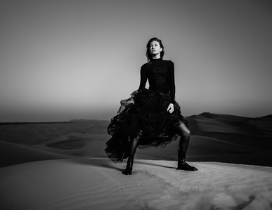 sand dunes fashion lifestyle photograph dressed in black allsaints boots natural beauty desert vintage perfume campaign photography zander fieschko zandervision