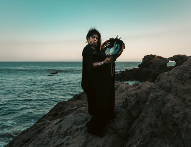 ocean goddess offering fish in ritual, spooky photography, psychedelic photography, storytelling, myth, trippy headshot, high fashion, surreal photography, dream photography, los angeles portrait, zandervision zander fieschko, fantasy, stylized headshots