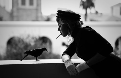 alfred hitchcock photo, crow lighting a cigarette, high fashion campaign, surreal photography, dream photography, los angeles portrait photographer, fantasy, dark fantasy, stylized headshots, zandervision zander fieschko