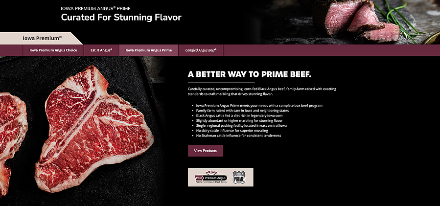 Beautiful picture of steak that is raw and bright red with marbling. 