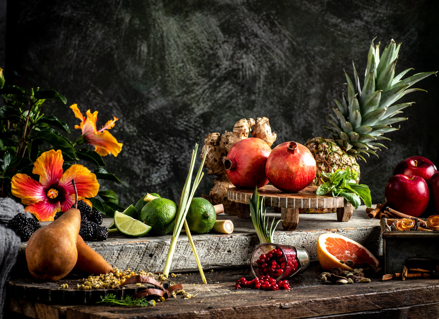Fresh Press Seltzer ingredients fruits spices and flowers arranged in a still life by a drink photographer