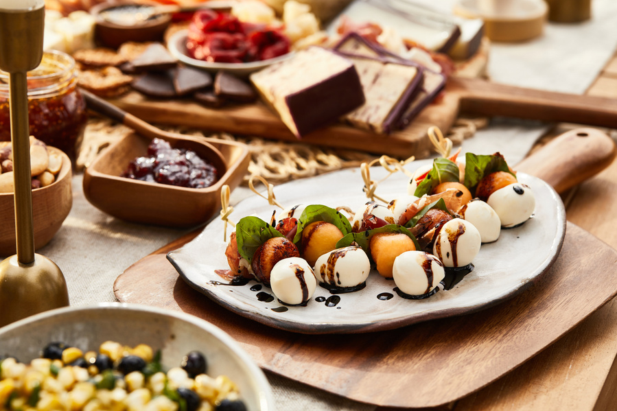 Close up on outdoor snack and charcuterie table Lifestyle food photography for The Buckle