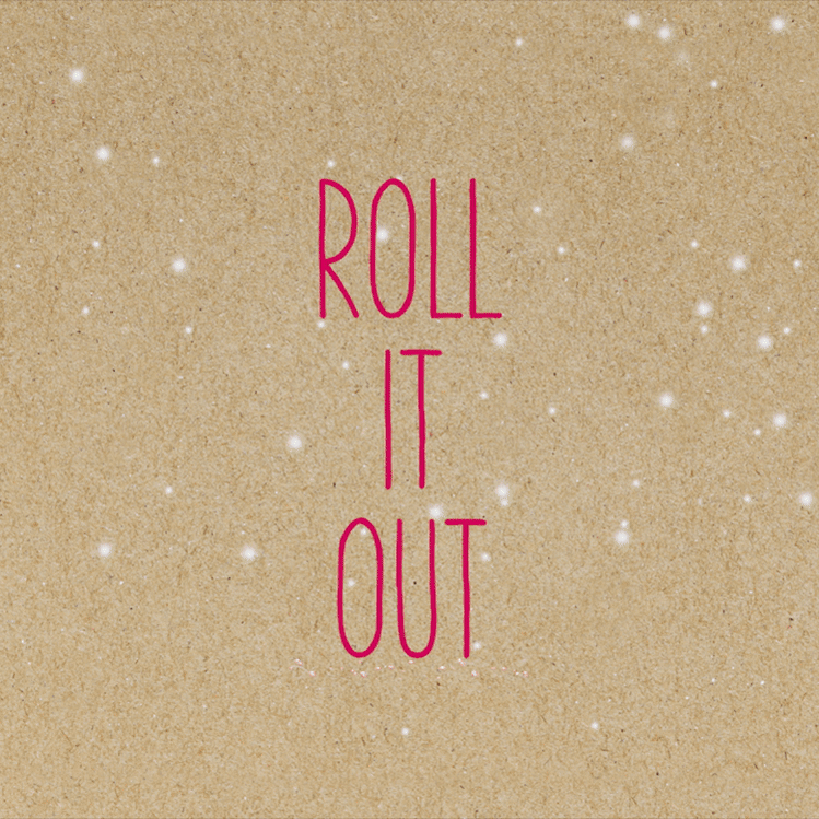 Text on a tan background says "Roll it Out" then hands take a ball of dough and roll it out with a bronze rolling pin on a marble surface. Part of a recipe video for brand photography with Maurices