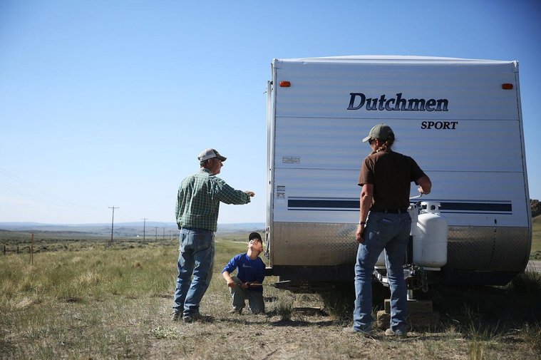 Eager to help, Ben helped to place the blocks and crank down the stands to hold the trailer steady once parked Thursday morning. Chris joked that each kid had their own role in camp: Ben helps with camp, Jamie with animals, and Joe picks up the leftovers.