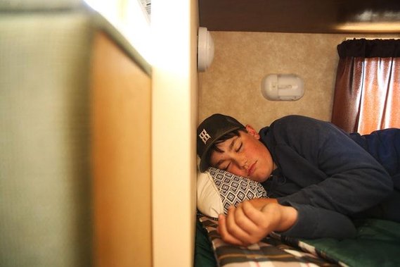 With the early mornings and late nights that come with the trek up the mountain, napping in the middle of the day between jobs is common for the kids. Joe was the first to crash after the mornings work, napping on his bottom bunk for an hour or so.
