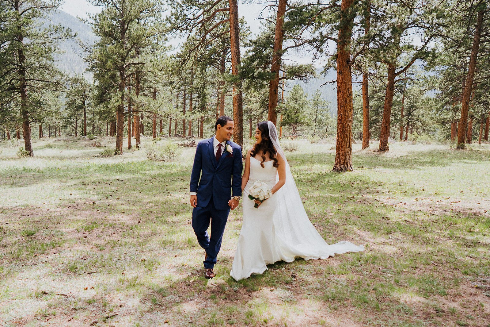 Bride and Groom walking, Della Terra Mountain Chateau.