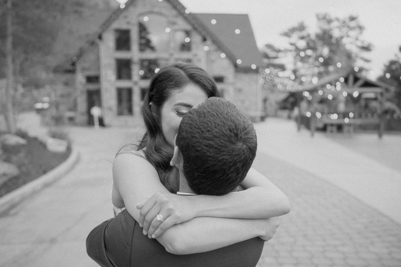 Bride and groom sharing a hug, Della Terra Mountain Chateau.
