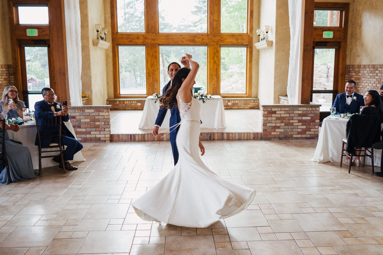 Bride and groom twirl, Della Terra Mountain Chateau.