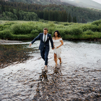 Wedding couple walking through water photographed with the Sony a7III showing autofocus tracking and real-world wedding photography performance.