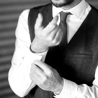 Black-and-white groom detail photographed with the Sony a7III for a real-world Sony a7III review sample gallery.
