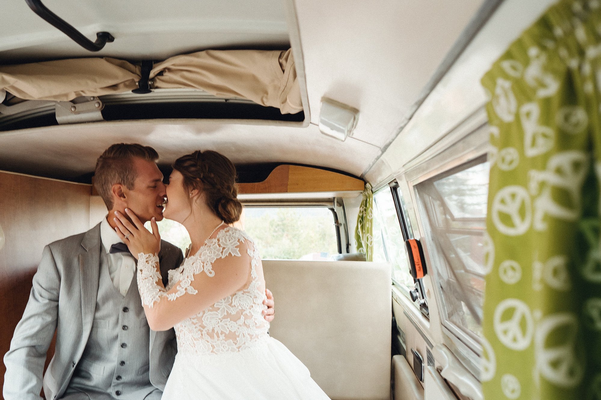 Couple portrait inside a vintage van by Denver wedding photographer Nick Sparks