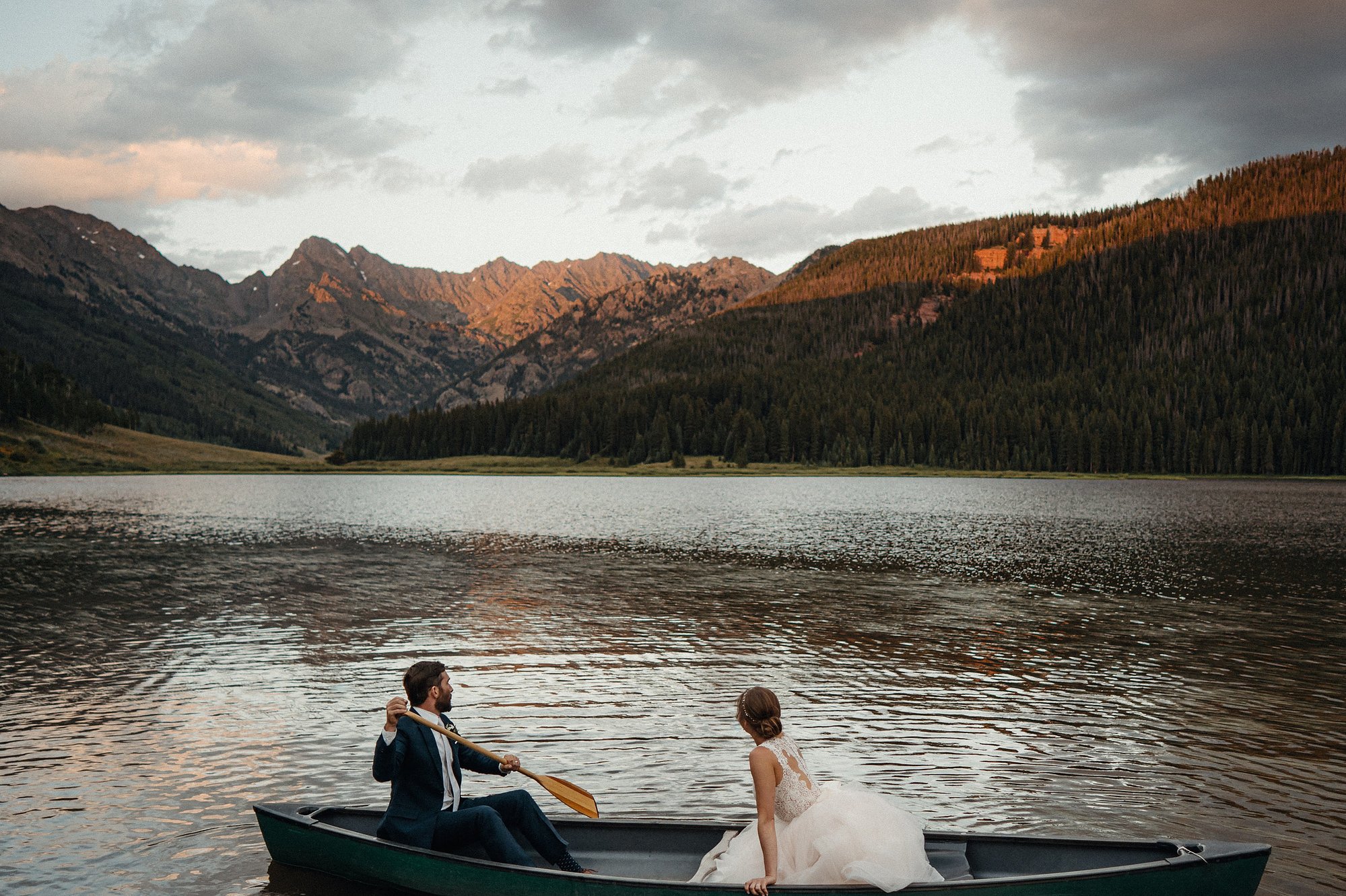 Couple portrait on a mountain lake in Colorado by Colorado wedding photographer Nick Sparks
