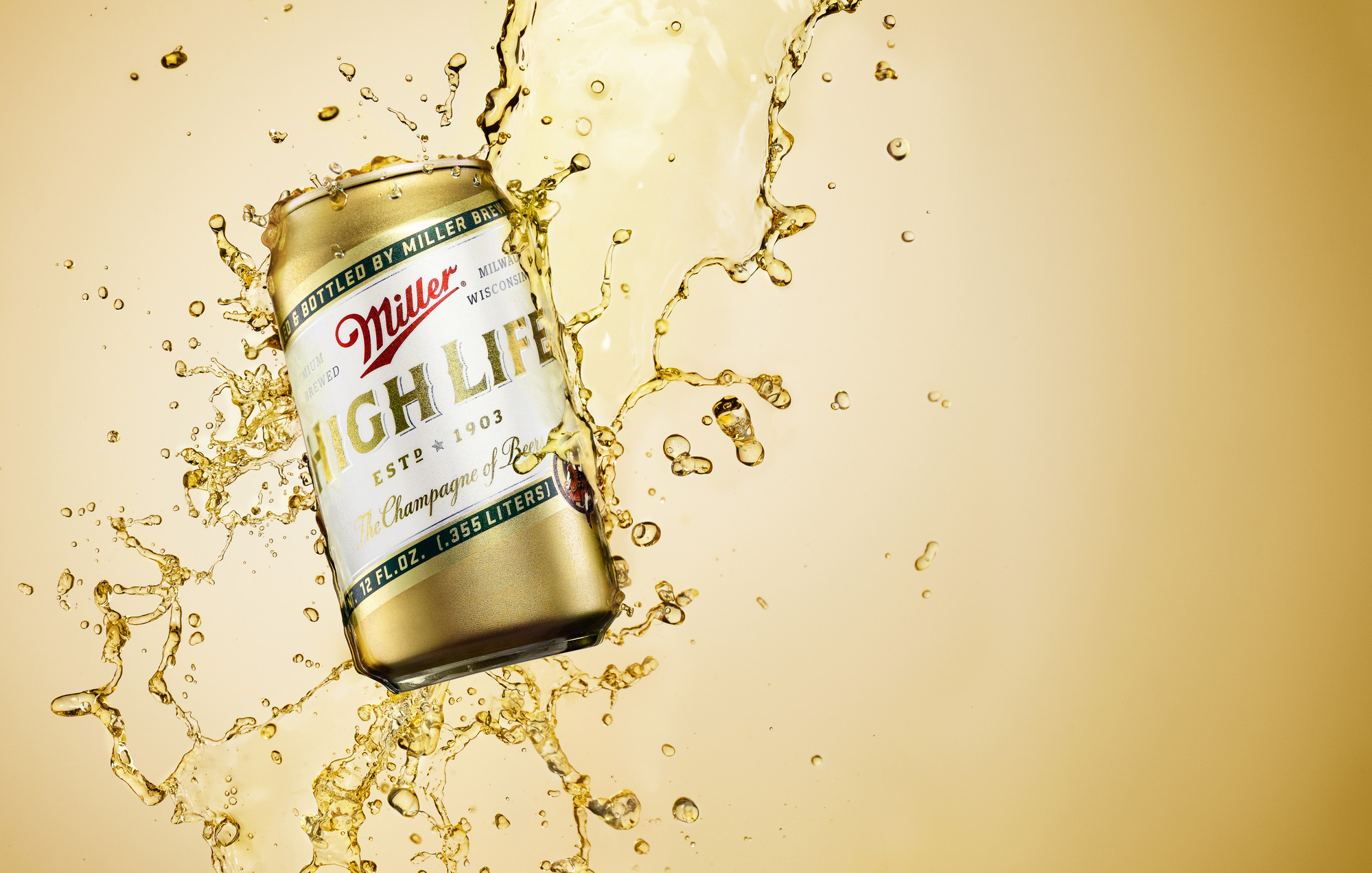 Miller High Life beer can splash photography  by beverage product photographer Timothy Hogan