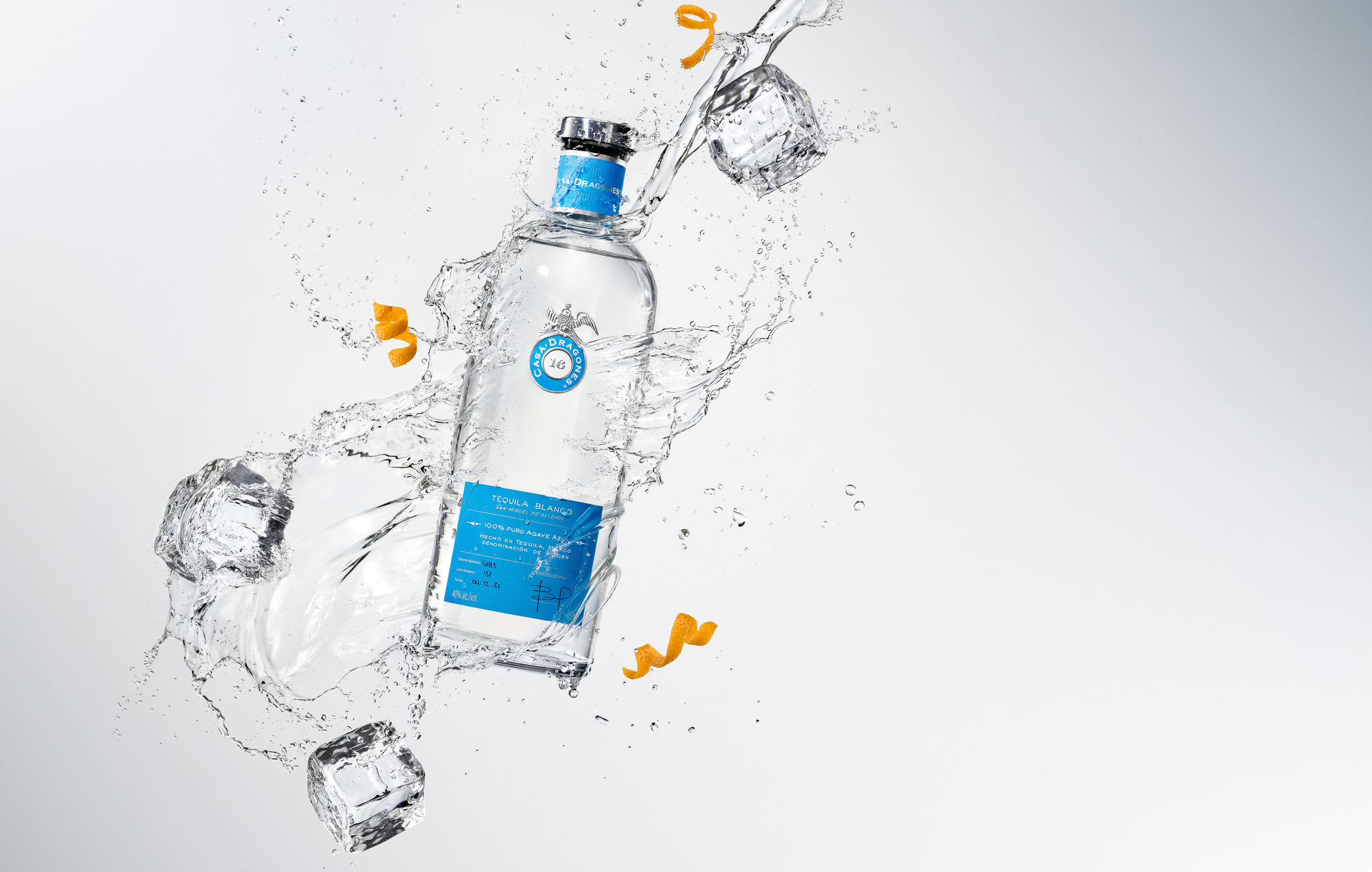 Casa Dragones Tequila Blanco. Splash photography shot. Beer, wine and liquor product photography by commercial and advertising beverage photographer / product photographer Timothy Hogan in Los Angeles