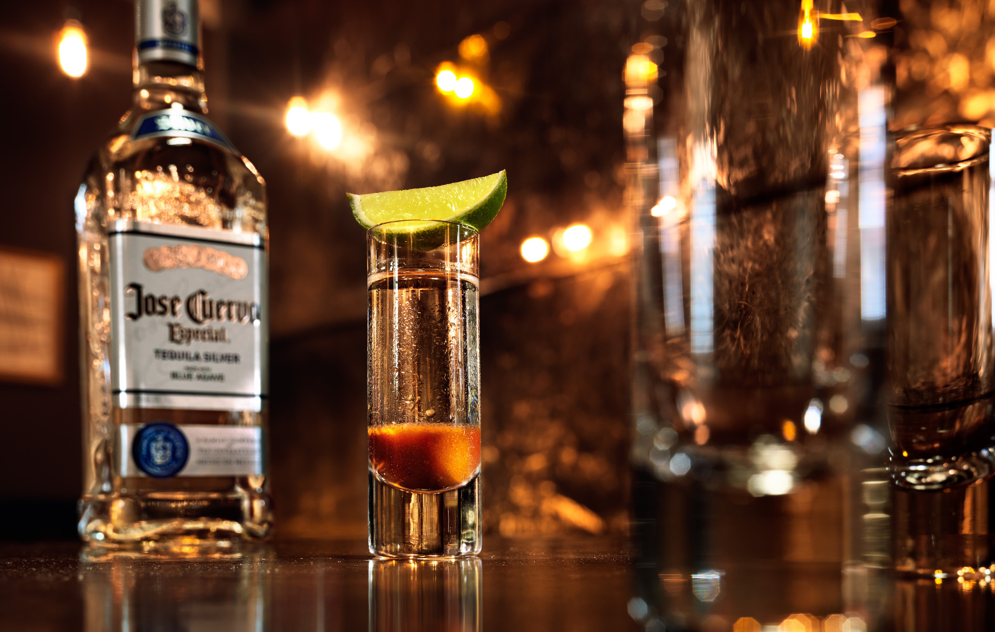 Jose Cuervo tequila bottle and shots by beverage photographer Timothy Hogan. 

Beverages and alcohol product & advertising photography by Timothy Hogan Studio in Los Angeles