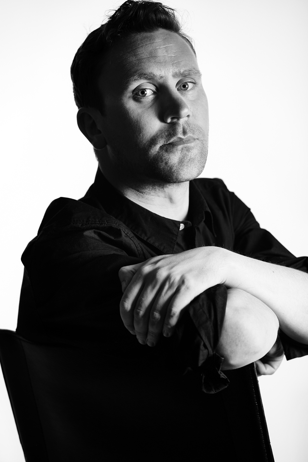 Black and white portrait of a male actor photographed in Matt's Norwich photographic studio. Shot by Norwich commercial, freelance portrait photographer Matt Keal.