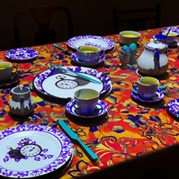 A projector scene from Curiouser & Curiouser exhibit. This changed and animated on a loop showing how trippy the Alice and wonderful tea party could get. I loved the colours!
