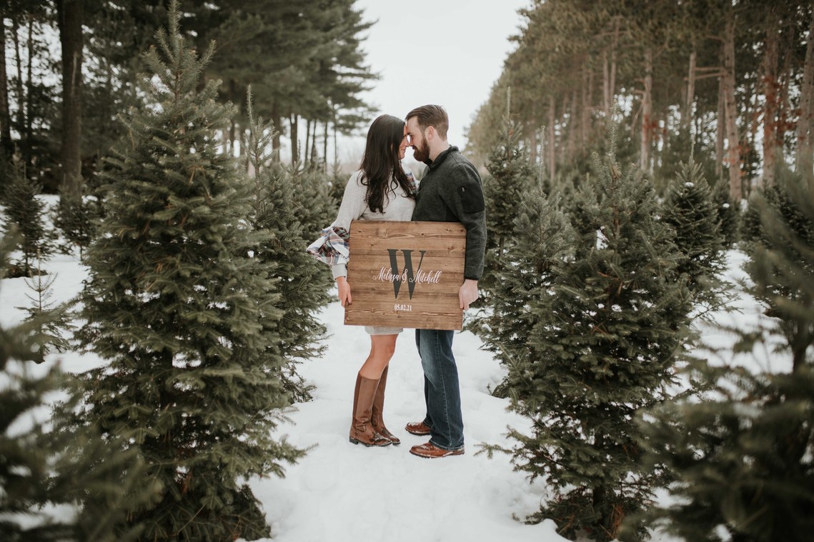 Engagement photos taken at a tree farm